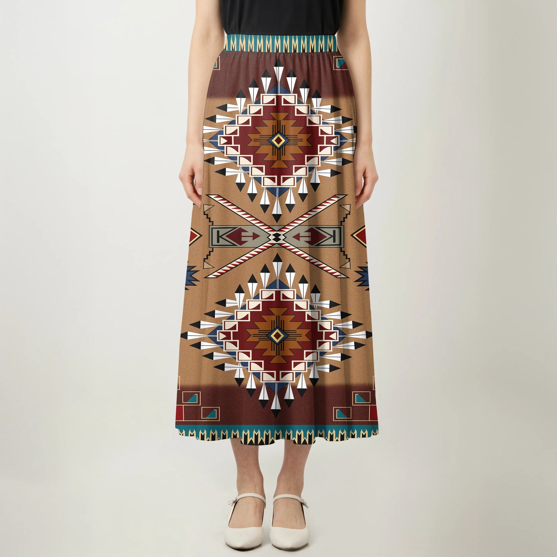 Front view of an asymmetrical maxi skirt with Native American Navajo Aztec geometric patterns and a teal waist detail.