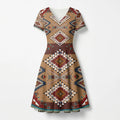 Full-length view of a women's V-neck A-line dress with Native American Navajo Aztec geometric patterns in earthy tones.