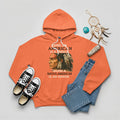 Orange hoodie with bold Native American design, symbolizing strength and empowerment.