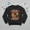 Black sweatshirt with a Native American design, reflecting strength, pride, and choice.