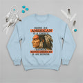 Blue sweatshirt featuring a Native American-inspired design, reflecting heritage and honor.