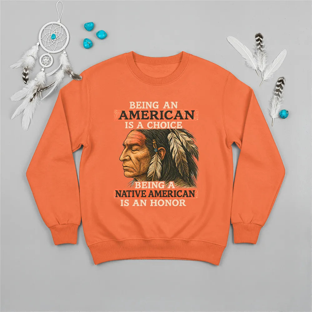Orange sweatshirt with bold Native American design, symbolizing strength and empowerment.