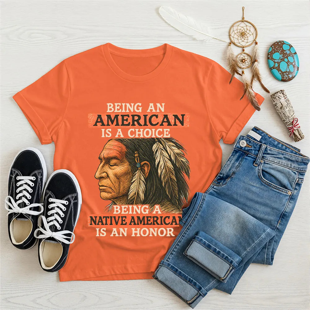 Orange t-shirt with a bold Native American design, representing pride and strength.