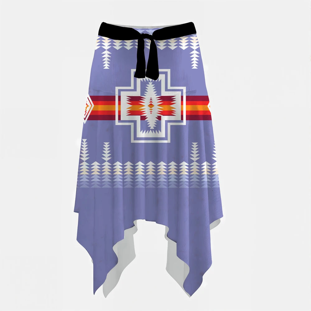 Handkerchief hem skirt with blue, black, and white eagle/thunderbird and geometric patterns.
