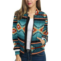 A female model showcases the Canyon Ridge Tribal Bomber Jacket, styled over a white top and jeans. The geometric design pops with cultural texture and modern flair, highlighting the comfortable fit and smooth zipper.