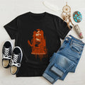 Black Native America tee with symbolic Indigenous girl graphic and powerful message, styled with denim and sneakers.