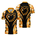 Short-sleeve polo shirt displaying “Every Child Matters” heart and butterfly graphic on black chest with orange white and black handprint panels.