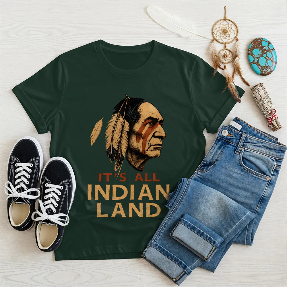 Green "It’s All Indian Land" T-shirt with feather and tribal art for heritage lovers.
