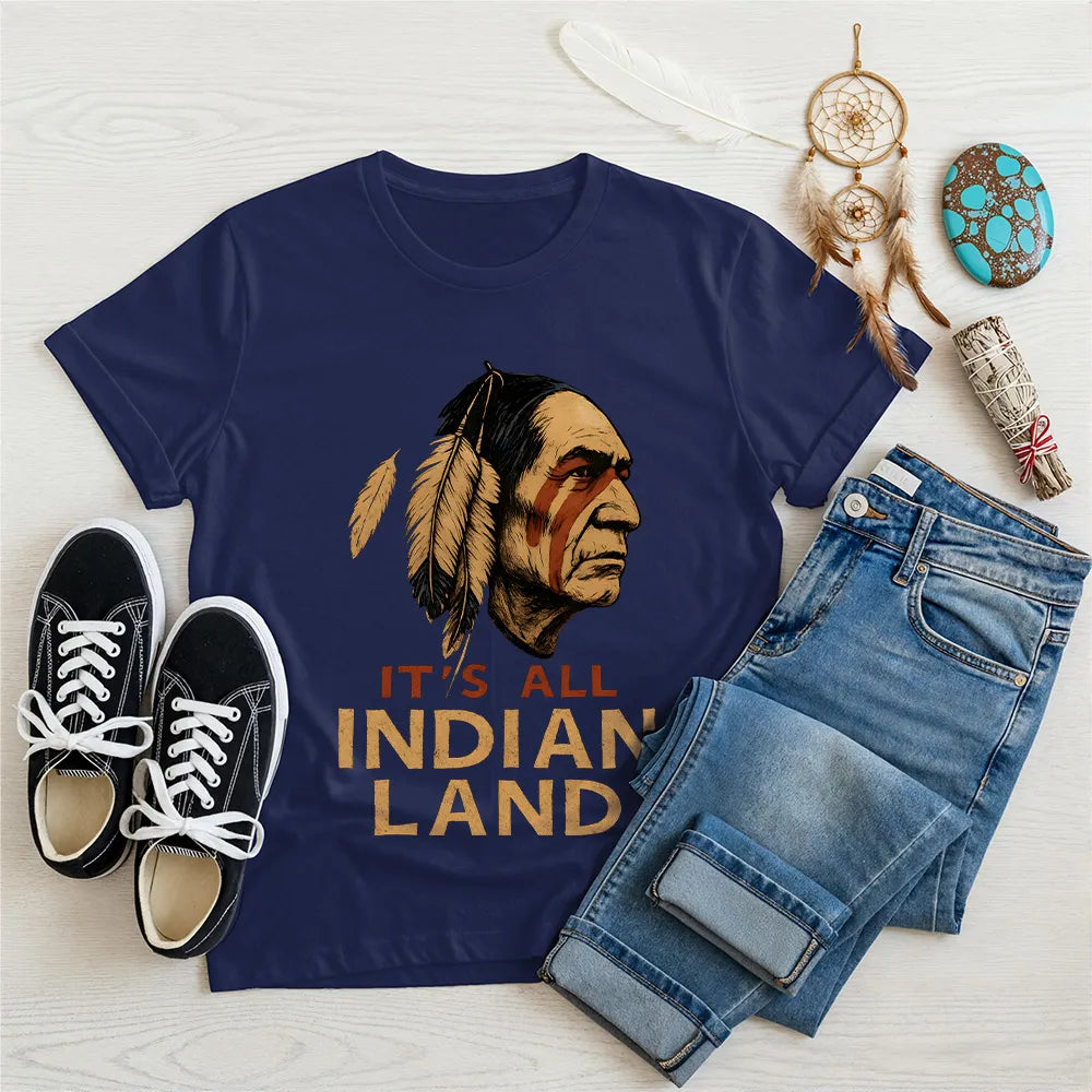 Navy blue t-shirt with Native American art, feathers, and "It’s All Indian Land" quote.