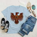 Light blue shirt featuring bold brown tribal eagle motif