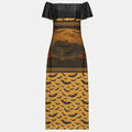 Full-length image of a woman wearing a black and orange off-shoulder maxi dress with a 