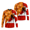 Long sleeve T-shirt with orange handprints and Canadian flag, ideal for awareness and cultural events.