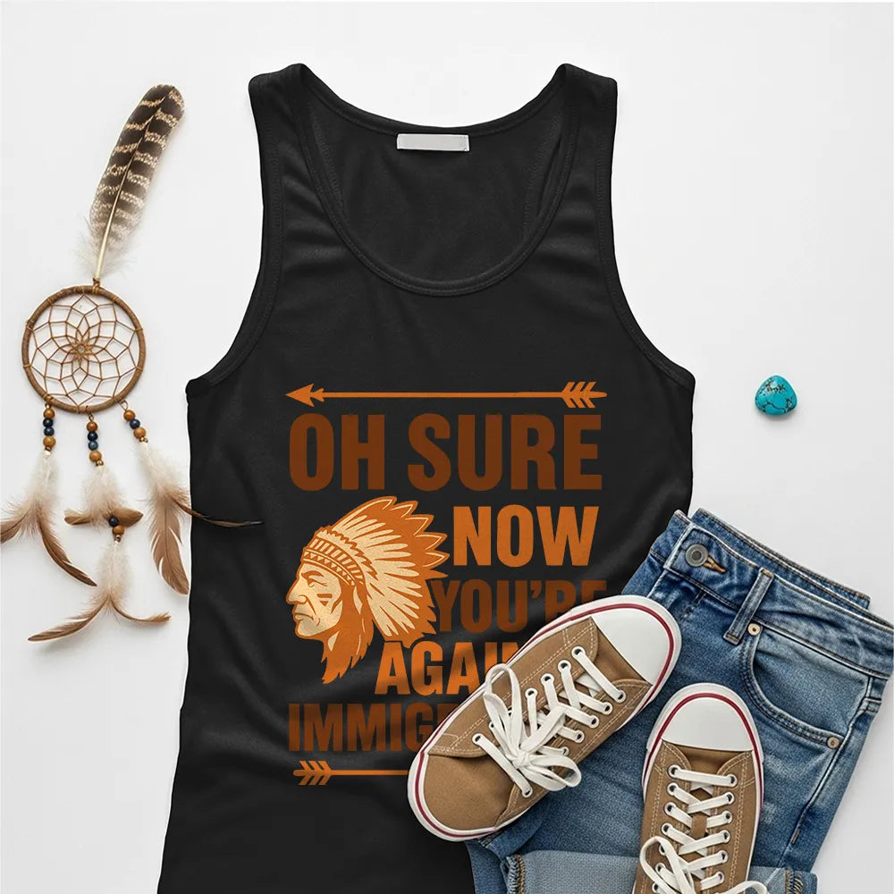 Black Native America graphic tank top with 'Oh Sure Now You’re Against Immigration' text and a traditional Indian chief headgear design