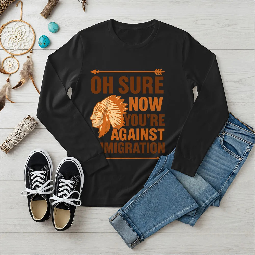 "Native American long sleeve tee with chief headdress and anti-immigration statement."