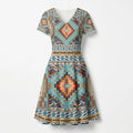 Full-length front view of a Native American Southwest Navajo-inspired V-neck A-line dress with intricate geometric tribal patterns in earthy tones.