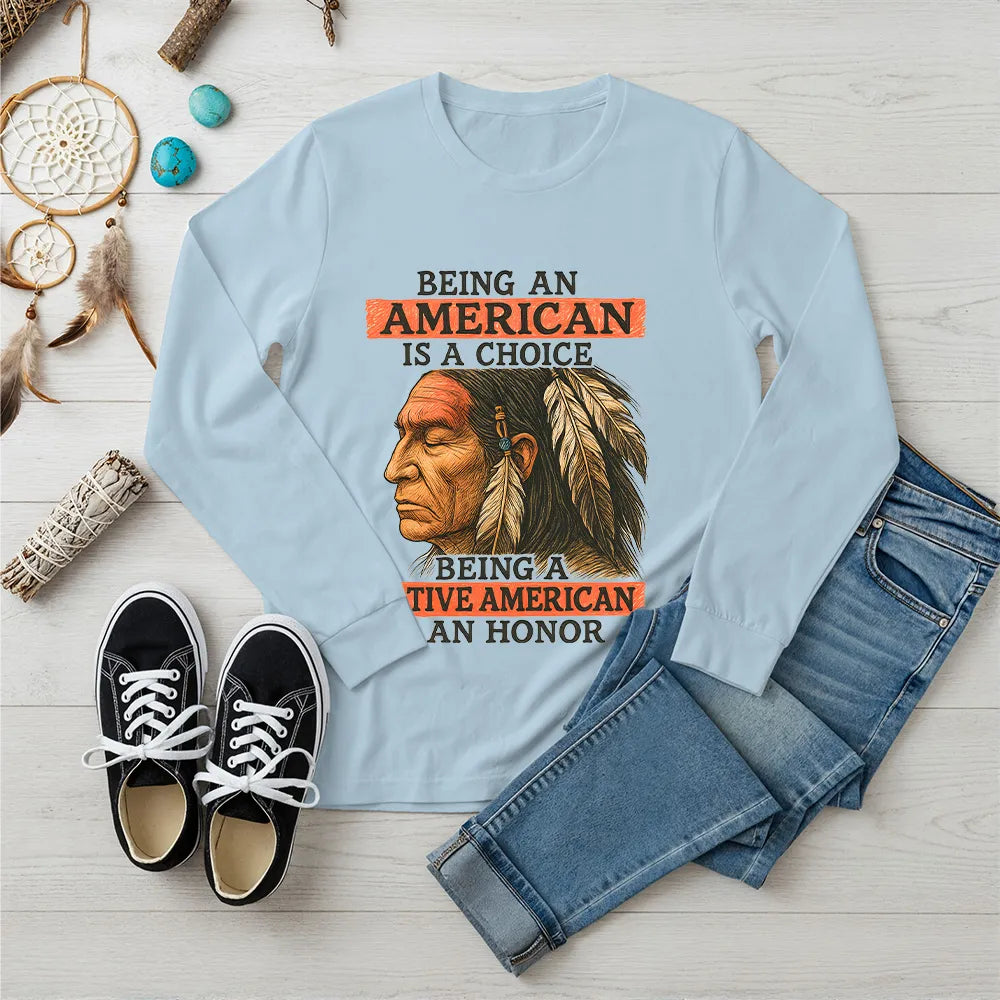 Blue long sleeve T-shirt with a Native American-inspired quote and tribal artwork celebrating pride and heritage.