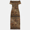 Full-length view of an off-shoulder maxi dress in a warm tan-brown shade, covered in a detailed Native American inspired print showcasing warriors on horseback, galloping horses, and repeating geometric tribal designs.