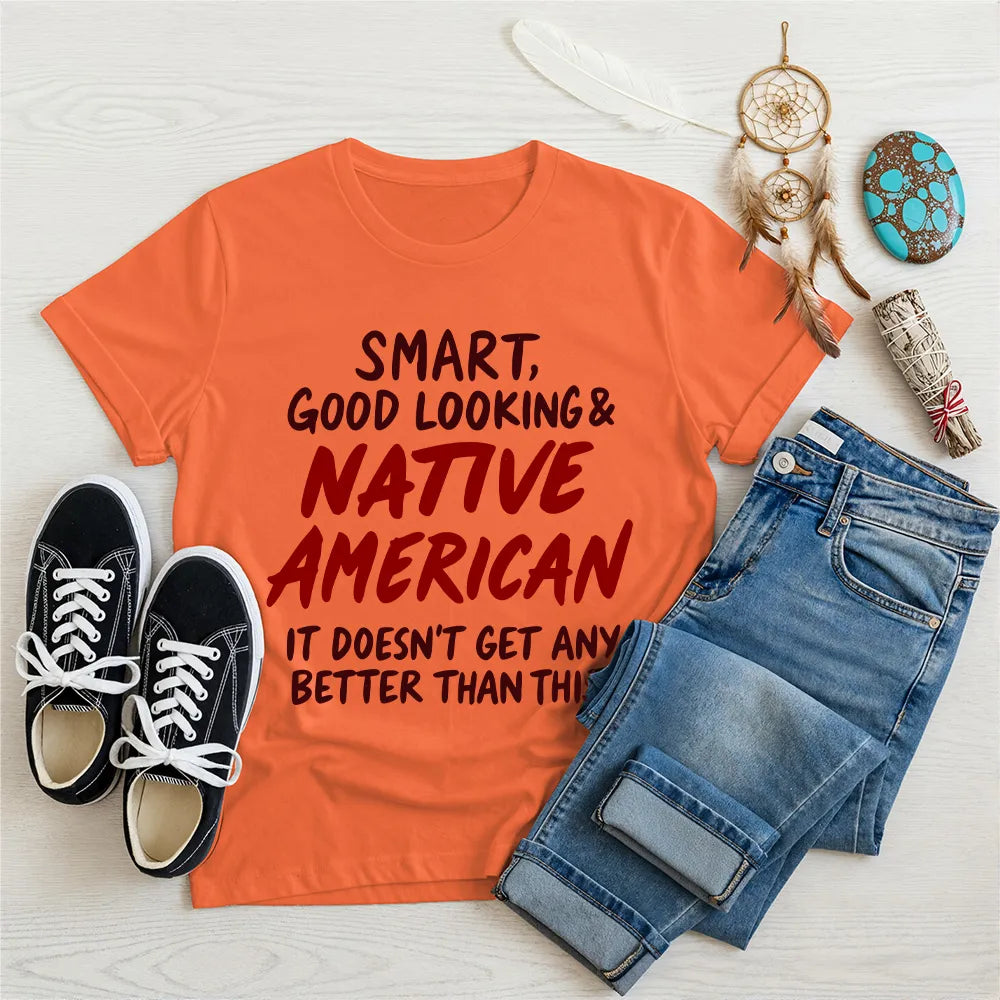 Orange T-shirt with Native American quote and artwork, representing strength and empowerment.