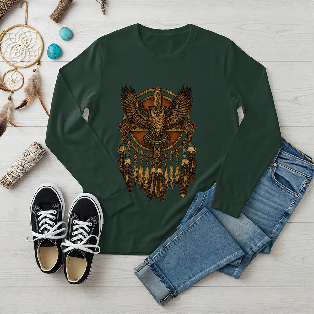 Green long sleeve with an owl and dreamcatcher design, representing strength and guidance from Native traditions.