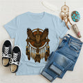 Blue t-shirt with a tribal owl and dreamcatcher design, symbolizing wisdom and protection.
