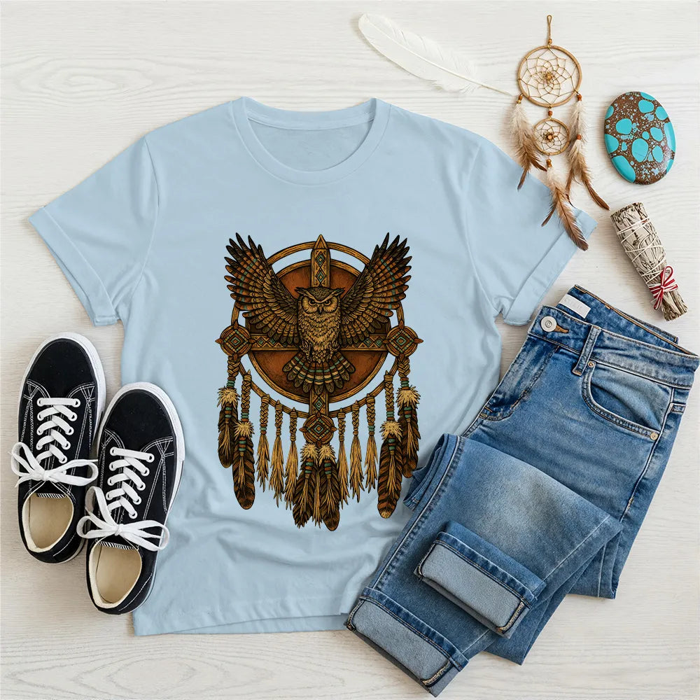 Blue t-shirt with a tribal owl and dreamcatcher design, symbolizing wisdom and protection.