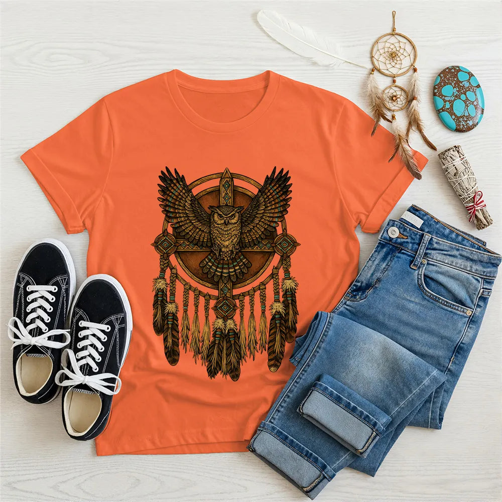 Orange t-shirt with Native American-inspired owl and dreamcatcher artwork, a symbol of spiritual guidance.