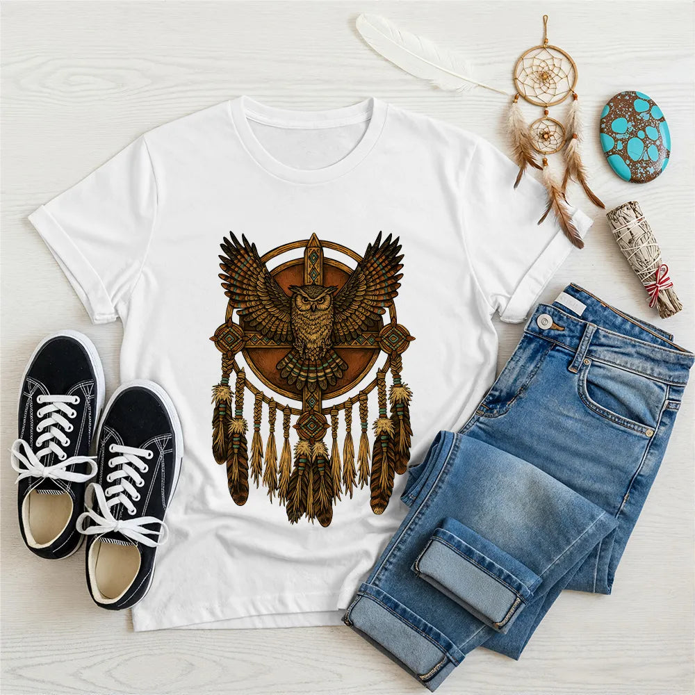 White t-shirt with a tribal owl dreamcatcher design, reflecting Native wisdom and cultural heritage.