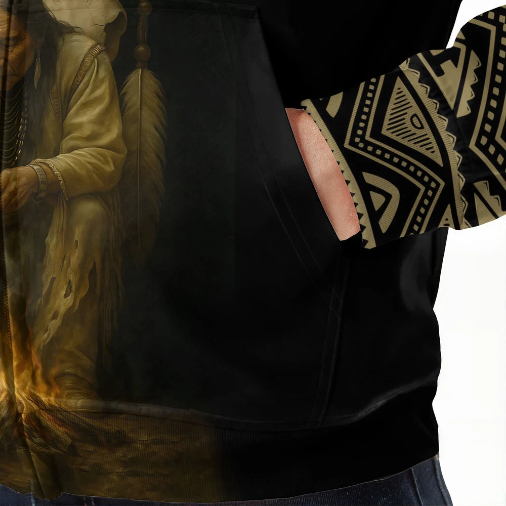 Tribal-inspired hoodie in black and gold featuring bold geometric patterns, with a powerful Native elder and buffalo skull illustration symbolizing Native Pride and cultural heritage.