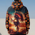 Back view of a hoodie showcasing a detailed print of a Native American dancer in a feathered headdress, silhouetted against a glowing sunset with tribal motifs on the sleeves and hood.
