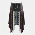 Full-body shot of a lady wearing a unique black geometric boho dress and skirt, perfect for tribal-inspired casual fashion.