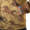 Close-up of jacket’s front kangaroo pocket area, highlighting detailed prints of running horses against a textured beige background and crisp stitching around pocket seams.