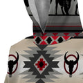 Close-up of quarter-zip collar and upper chest showing buffalo skull icon and stepped triangle pattern in red, black, and beige