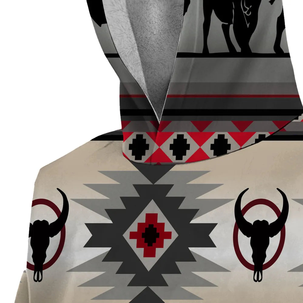 Close-up of quarter-zip collar and upper chest showing buffalo skull icon and stepped triangle pattern in red, black, and beige