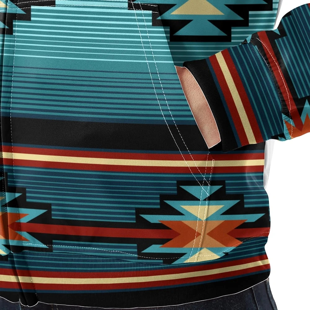 Front view of a male model in a teal Southwestern tribal hooded wearable blanket jacket with kangaroo pocket and geometric motifs