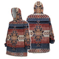 Front and back views of a hooded blanket featuring inspired pattern with earthy red, sand, and navy blue geometric motifs resembling a Southwestern sunset skyline.