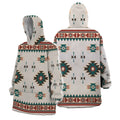 
Front and back views of a snug hoodie with a desert twilight tribal pattern in muted cream, teal, and rust colors, featuring large geometric medallions and arrow motifs across the body and sleeves.