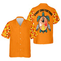 Orange camp‑collar button‑up shirt with scattered handprint sleeves and a turtle handprint graphic plus “Every Child Matters” across the shoulders on the back.