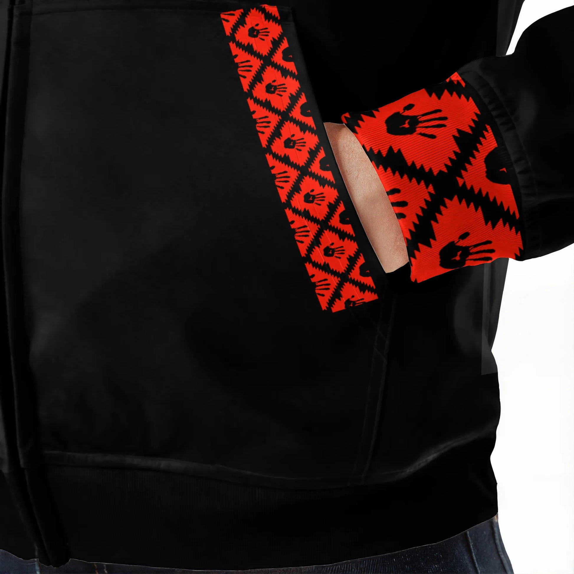 Side pocket detail with red handprint pattern on black fabric