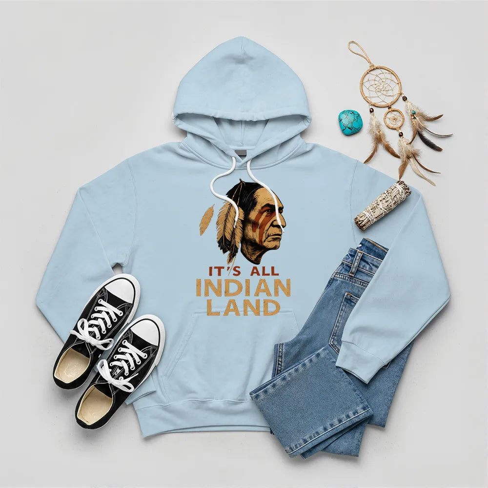 A dark grey hoodie showcasing the "It’s All Indian Land" slogan and Native American headdress design