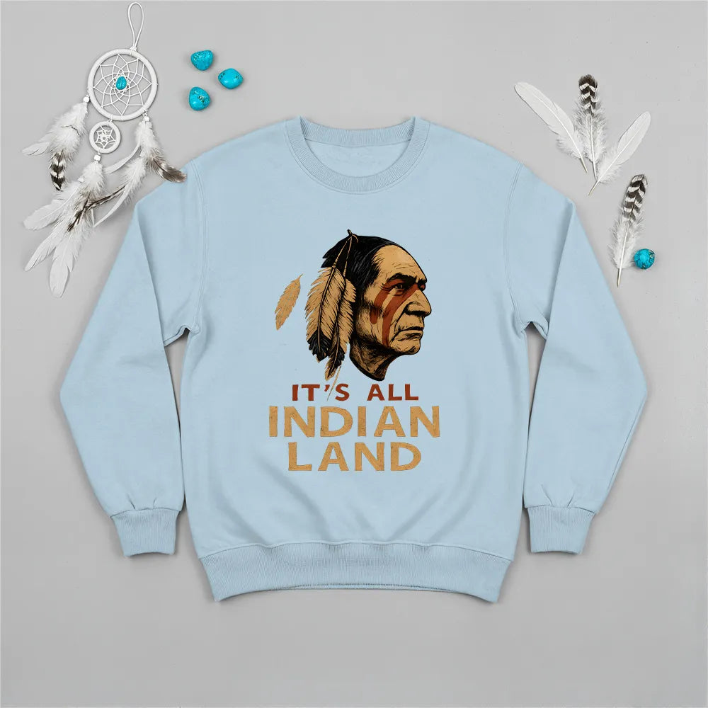 A light blue sweatshirt with the "It’s All Indian Land" message and Native American headdress illustration.