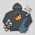 A dark grey hoodie featuring the MMIW awareness design, styled for powerful messaging.