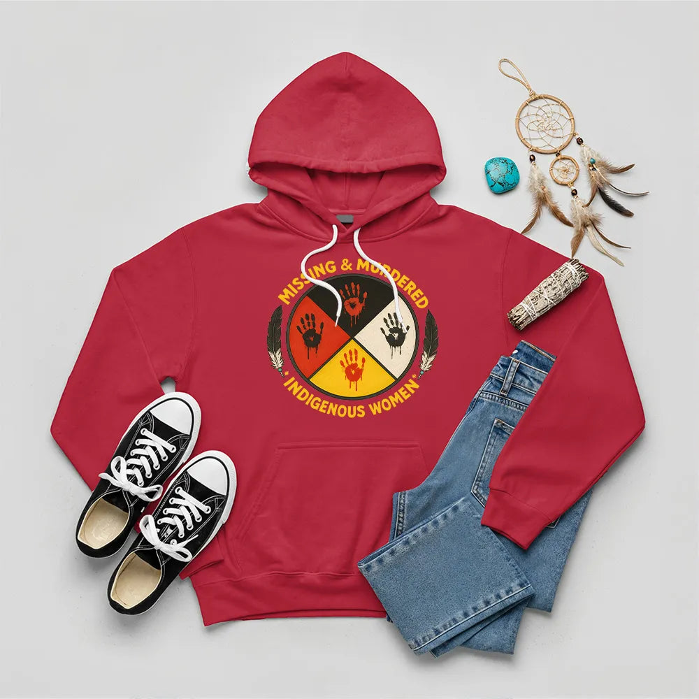 A red hoodie featuring the prominent MMIW awareness design with a red handprint and feathers.