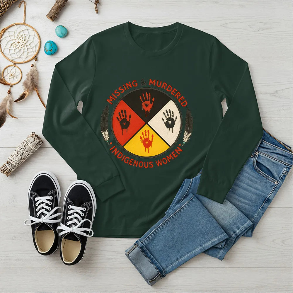 A forest green long-sleeve t-shirt showcasing the MMIW awareness design with the red handprint and feathers.