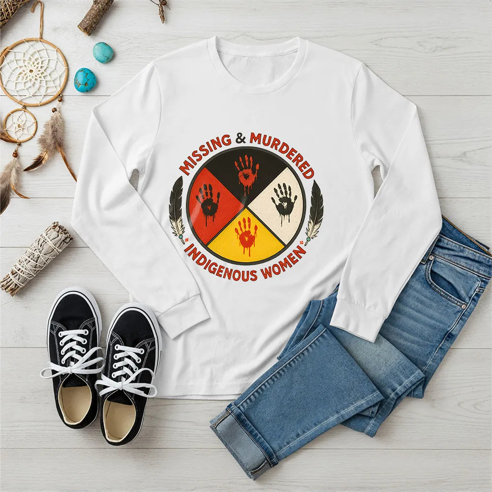 A white long-sleeve t-shirt displaying the MMIW awareness graphic with a red handprint, feathers, and text, laid flat.