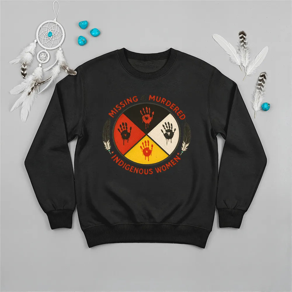 A black sweatshirt with a "Missing & Murdered Indigenous Women" graphic featuring a red handprint over feathers and text.