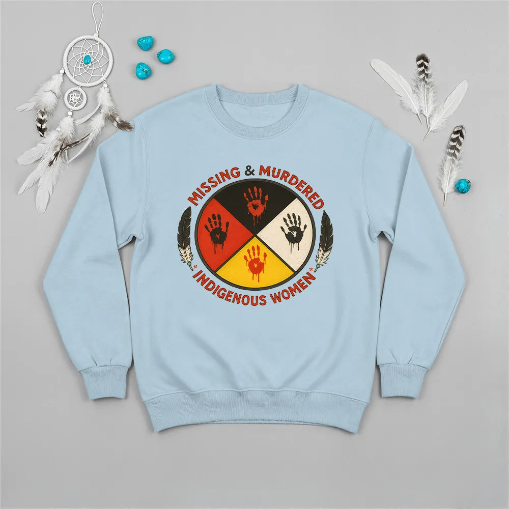 A light blue sweatshirt with the MMIW advocacy graphic, presented for social awareness.