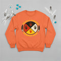 An orange sweatshirt with the 