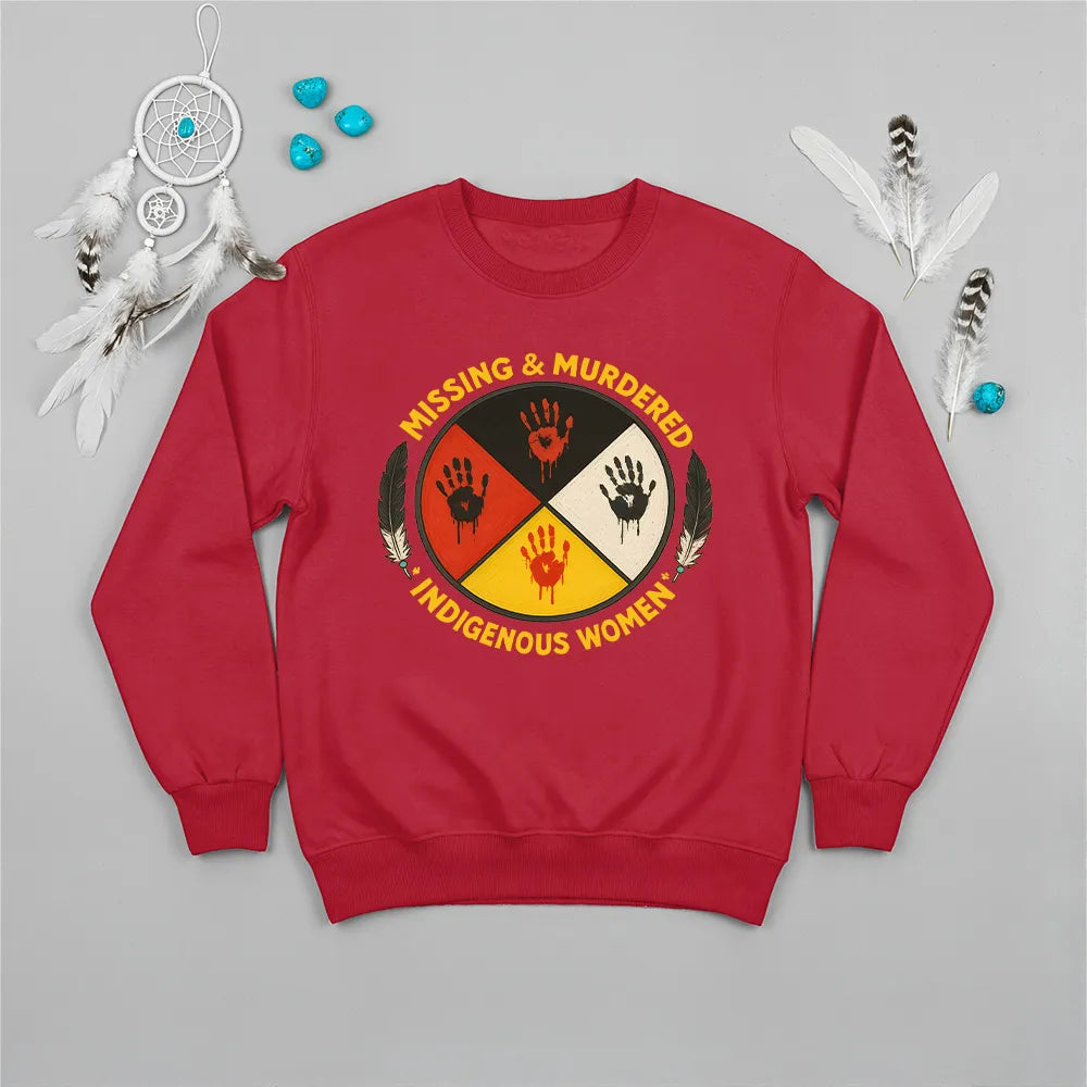 A red sweatshirt featuring the prominent MMIW awareness design with a red handprint and feathers.