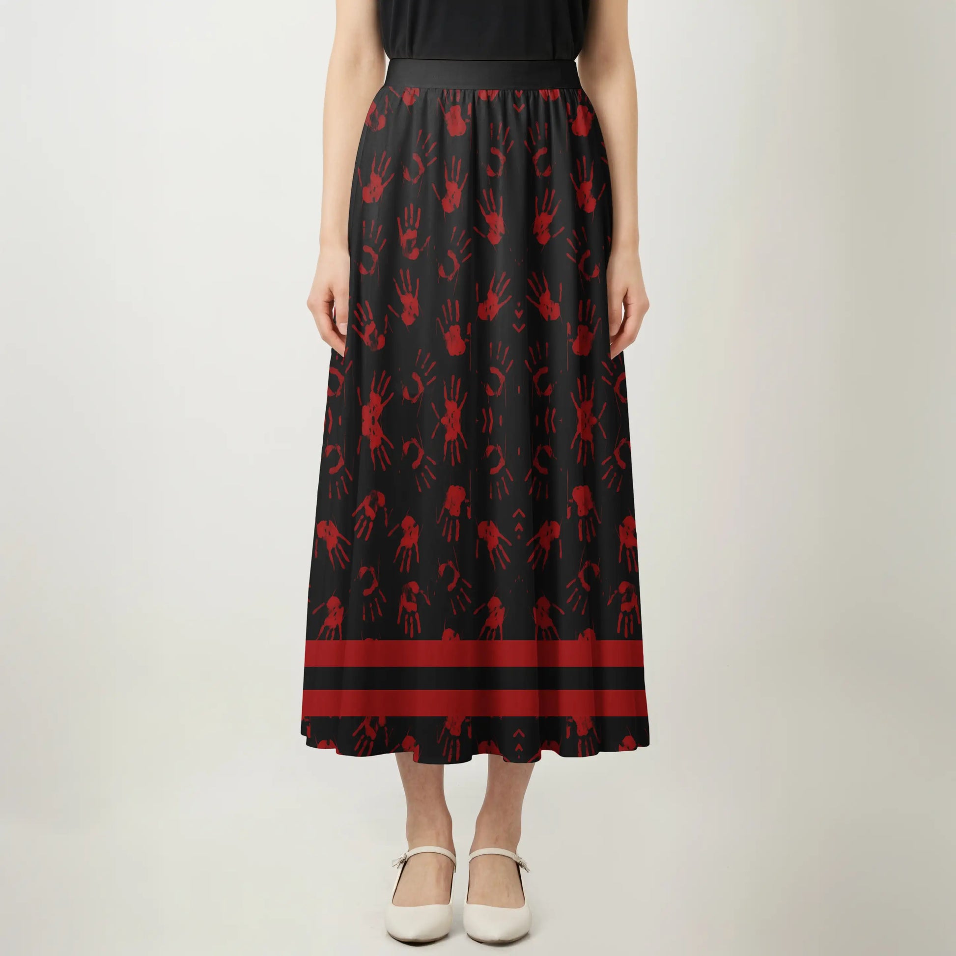 Maxi skirt featuring red handprints and symbolic Native design calling for justice for Indigenous women