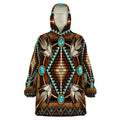 Front view of snug sherpa hoodie displaying intricate beadwork design with arrows, turquoise accents, and feather motifs on a brown background